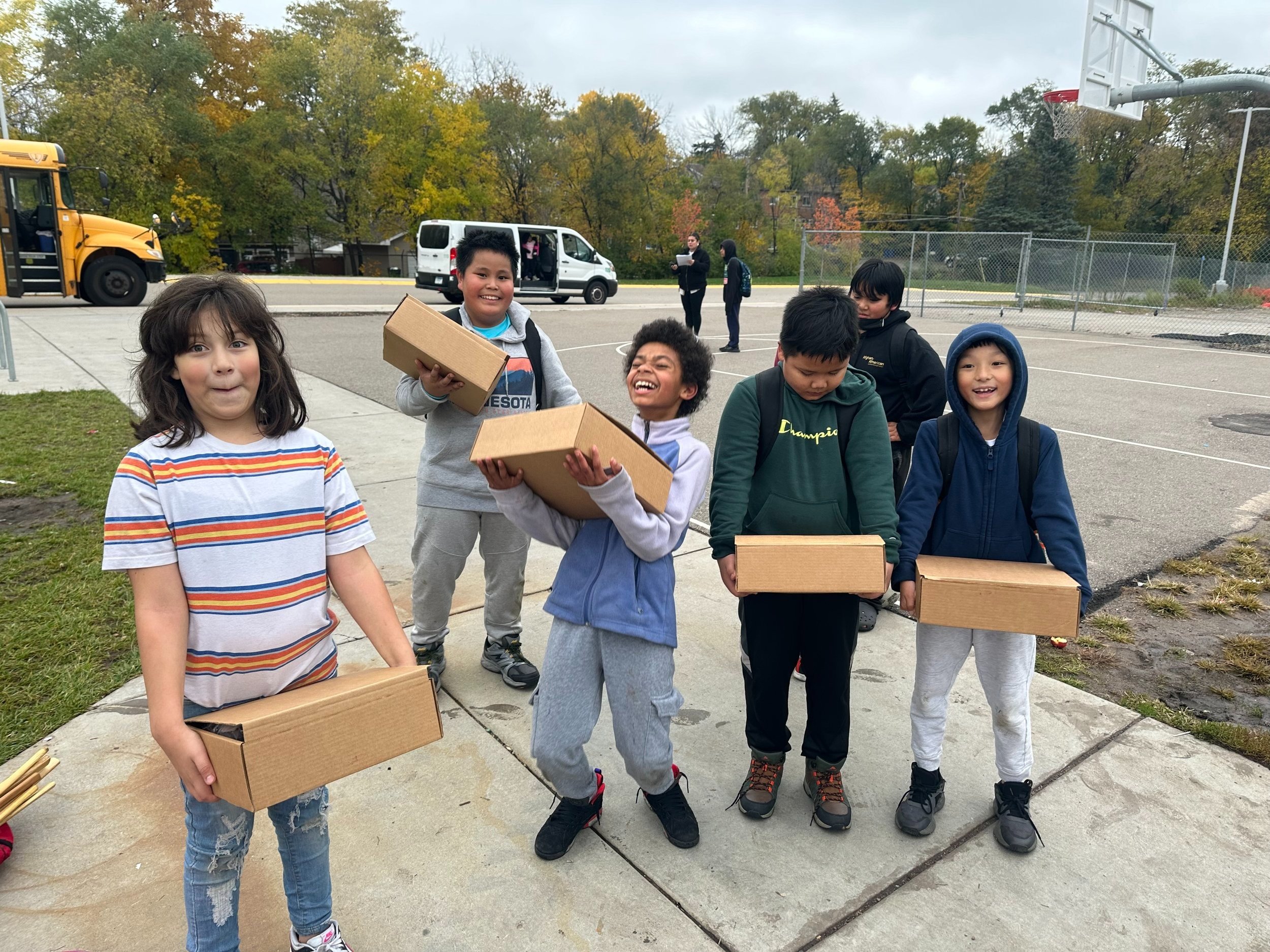 Students with family food kits
